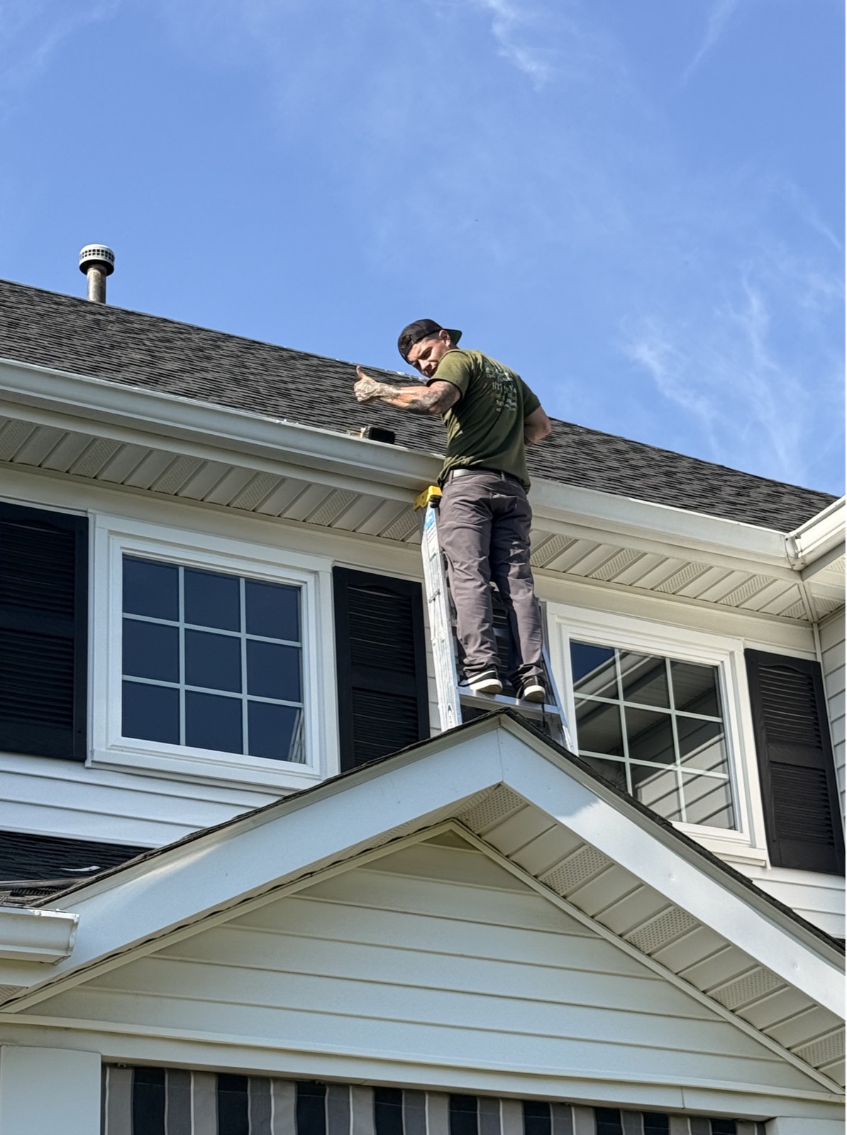 Gutter guard installation work from a ladder